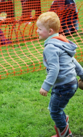Young visitor at the coconut shy Fair and Show 2015