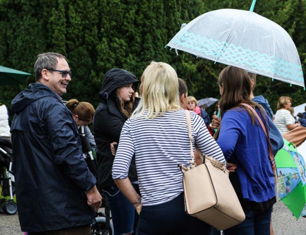 Church warden Dean Hall with visitors to the Fair and Show 2016